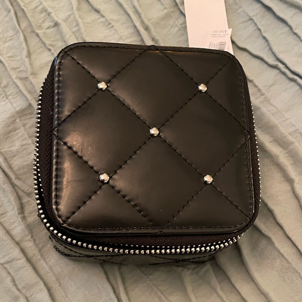 Hard sided travel jewelry box with mirror